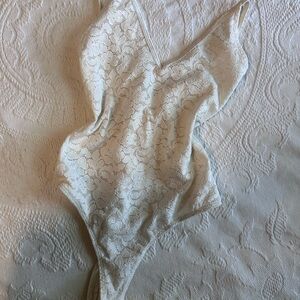 White lace one peice bodysuit